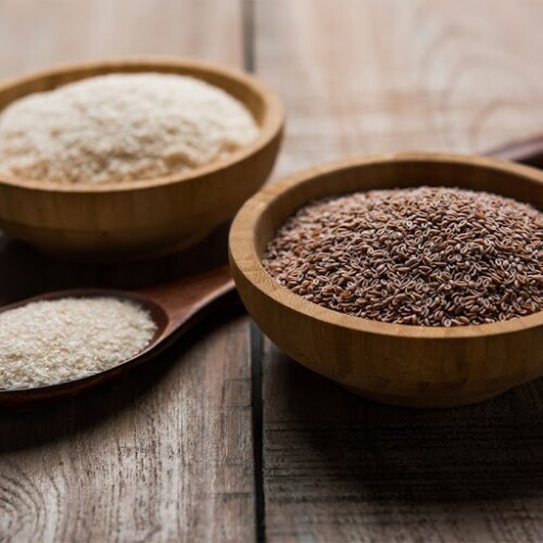 1-2 TasteSarda Bio Polymers - ISABGOL 10C (Psyllium Husk Powder 95% pure) shown in wooden bowls on rustic wooden surface